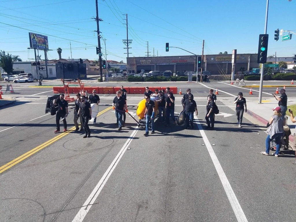 The rLoop team carrying its Hyperloop competition pod through the street